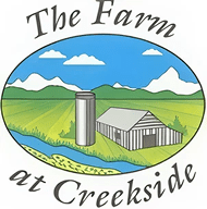 Creekside farm emblem with river and fields