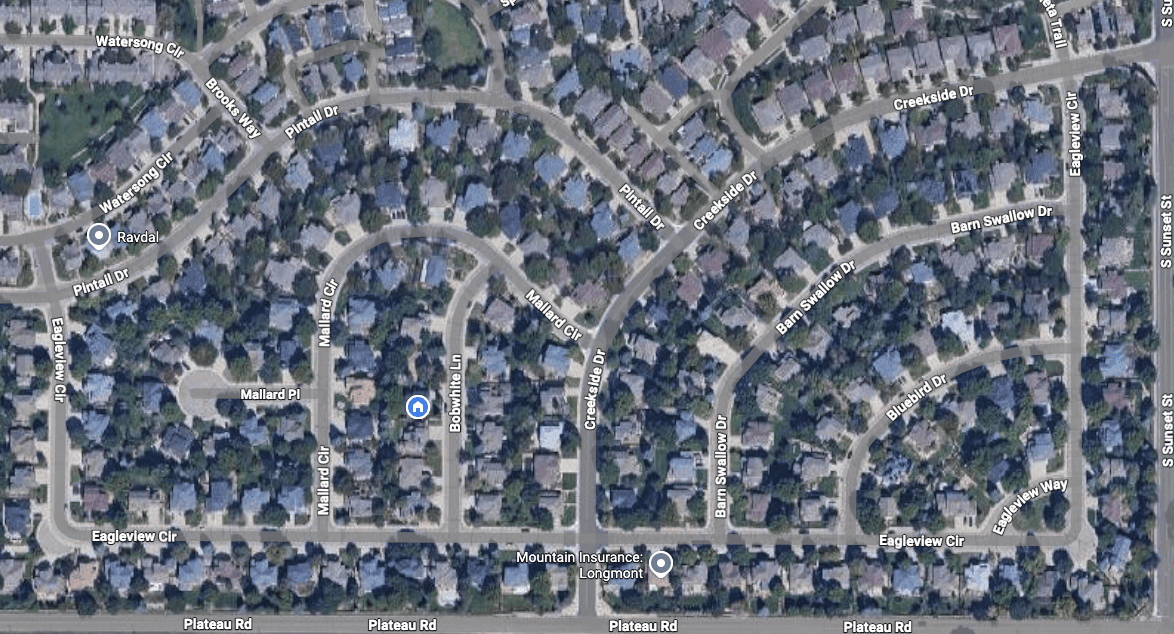 Aerial view of suburban neighborhood layout.