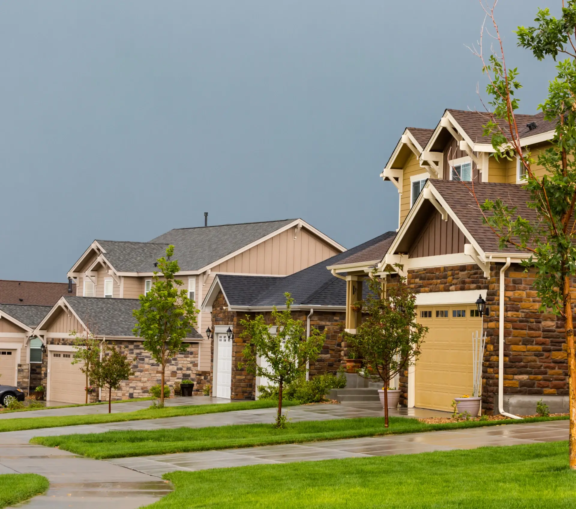 Row of houses under cloudy sky